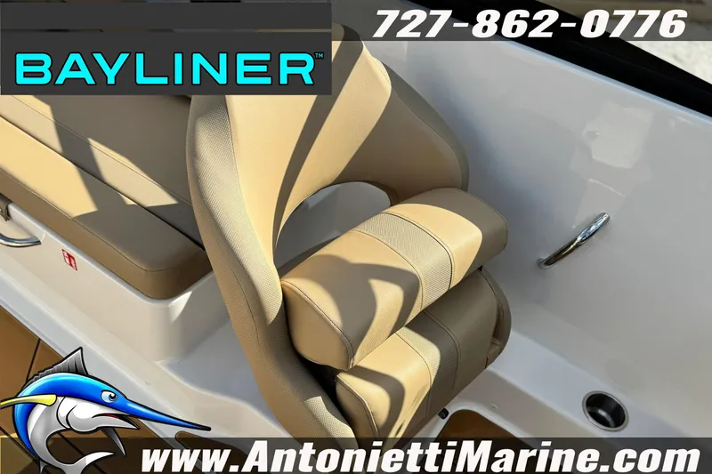 Slide: The Image of 2026 Bayliner V20 boat interior with beige seating, Antonietti Marine branding. - 22