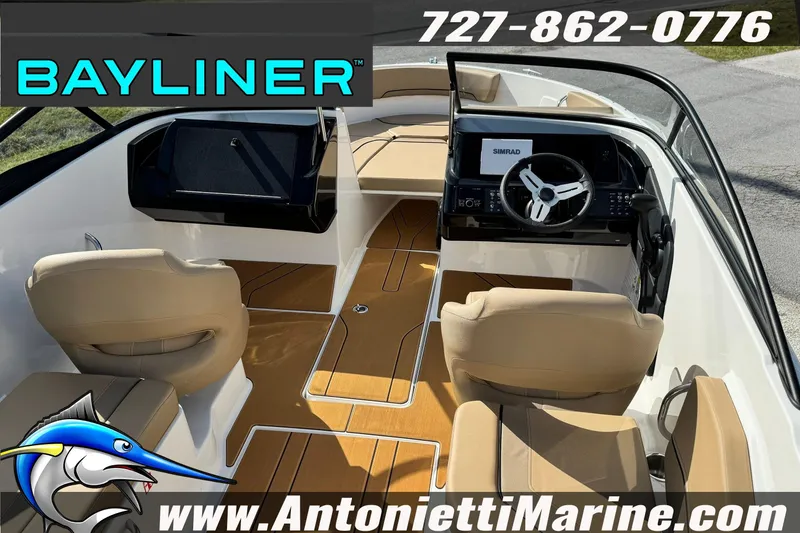 Slide: The Image of 2026 Bayliner V20 boat interior with tan seats and modern dashboard. - 30