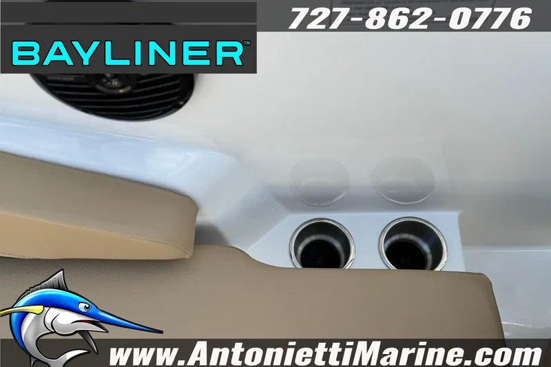 Slide: The Image of 2026 Bayliner V20 boat interior with cup holders and speaker, featuring Antonietti Marine branding. - 32