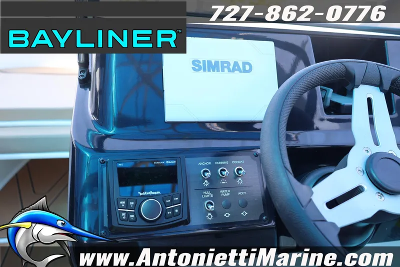 Slide: The Image of 2026 Bayliner V20 dashboard with Simrad navigation and Rockford Fosgate audio system. - 6