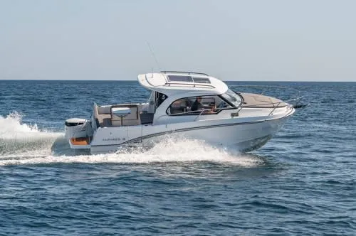 Slide: The Image of 2024 Beneteau Antares 8 V2 cruising on open water. - 2