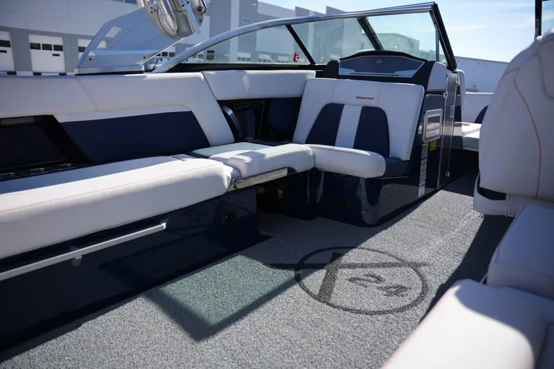 Slide: The Image of 2019 MasterCraft X24 boat interior with luxurious seating and modern design. - 18