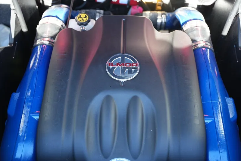 Slide: The Image of Ilmor engine in 2019 MasterCraft X24 boat, featuring blue accents and branding. - 22
