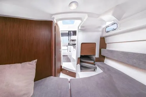 Slide: The Image of Interior cabin of 2024 Beneteau Antares 8 V2, featuring modern design and comfortable seating. - 11