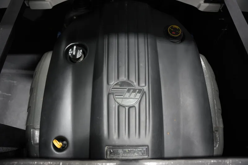 Slide: The Image of 2020 Malibu Wakesetter 21 VLX engine close-up, showcasing detailed components. - 13