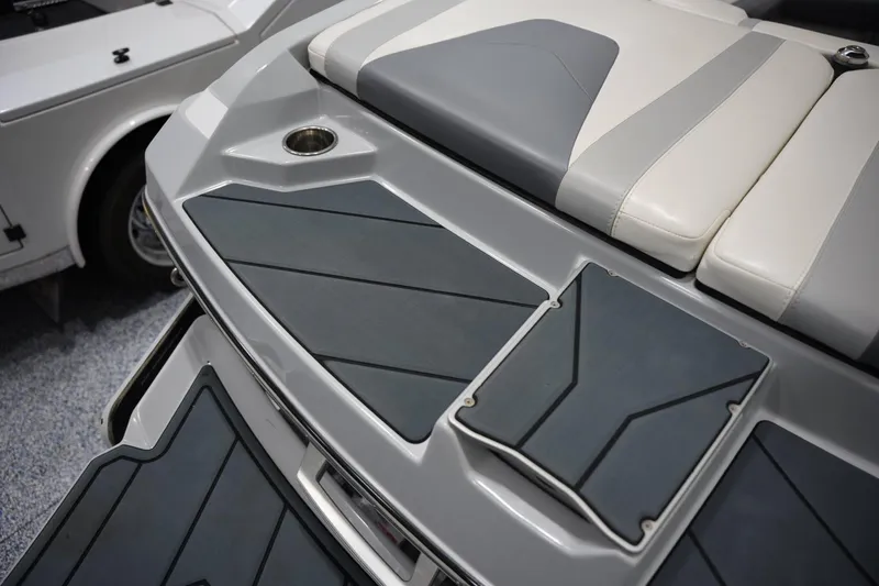 Slide: The Image of 2020 Malibu Wakesetter 21 VLX boat interior with cushioned seating and sleek design. - 16