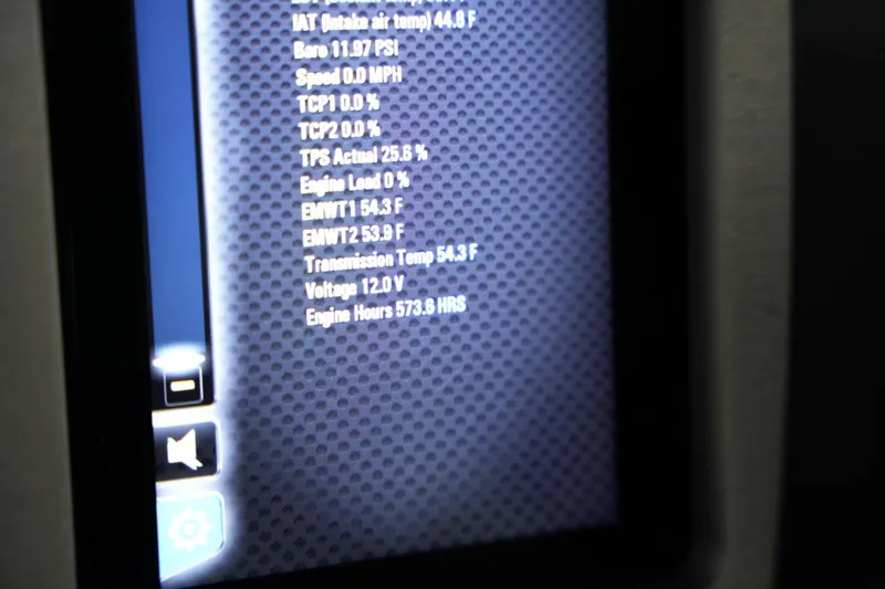 Slide: The Image of Dashboard display of a 2020 Malibu Wakesetter 21 VLX showing engine metrics and settings. - 20