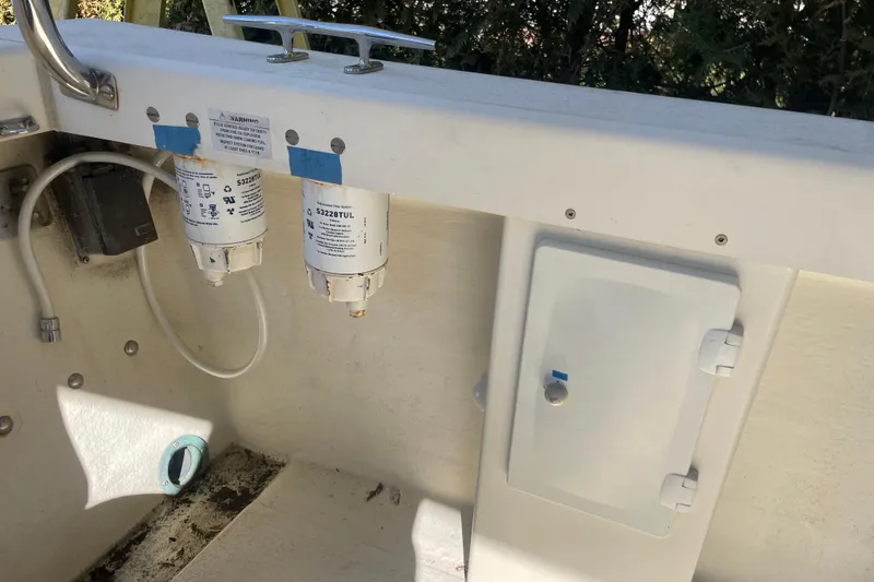 Slide: The Image of 2007 Rosborough RF-246 Sedan Cruiser interior showing fuel filters and storage compartment. - 17