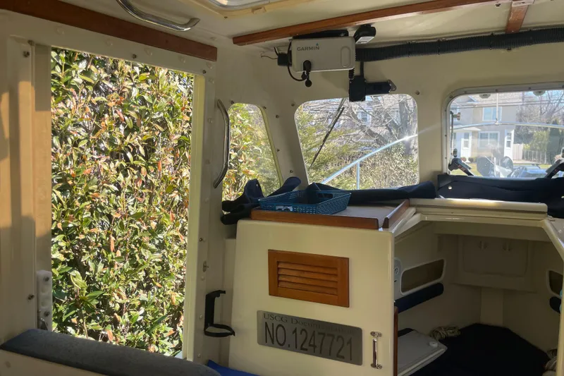 Slide: The Image of Interior of 2007 Rosborough RF-246 Sedan Cruiser with windows and seating area. - 24