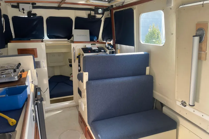 Slide: The Image of Interior of 2007 Rosborough RF-246 Sedan Cruiser with seating and navigation equipment. - 26