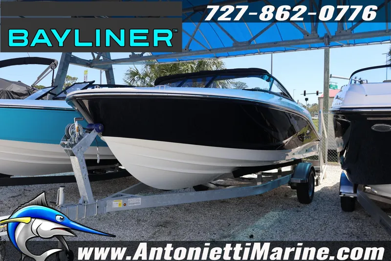 The Image of 2026 Bayliner V20 boat on trailer at Antonietti Marine dealership. - 1