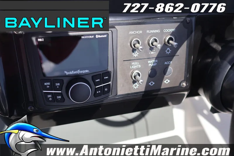 Slide: The Image of Control panel of 2026 Bayliner V20 boat with audio system and switches. - 16