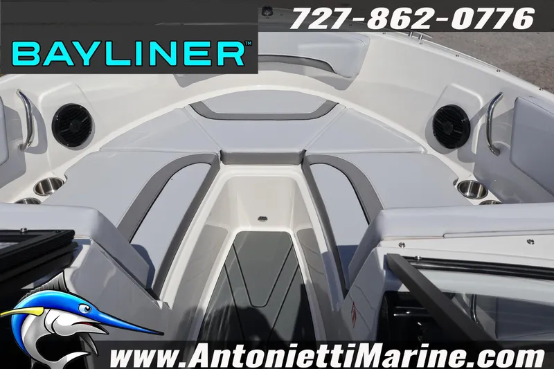 Slide: The Image of Bayliner V20 2026 boat interior with seating, speakers, and cup holders. - 22