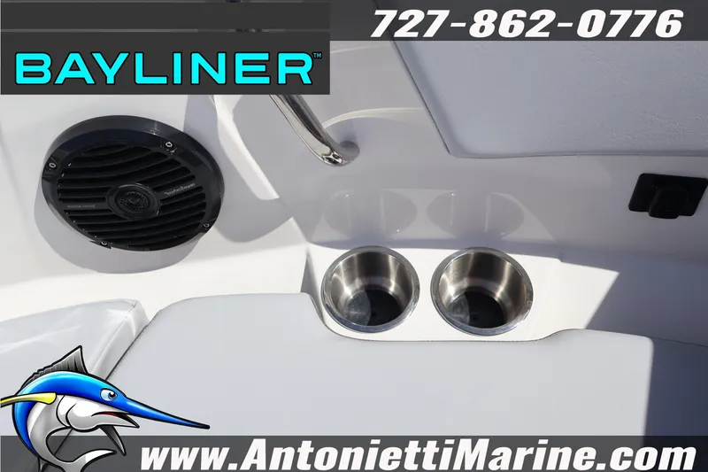 Slide: The Image of 2026 Bayliner V20 boat interior with cup holders and speaker, Antonietti Marine branding. - 23