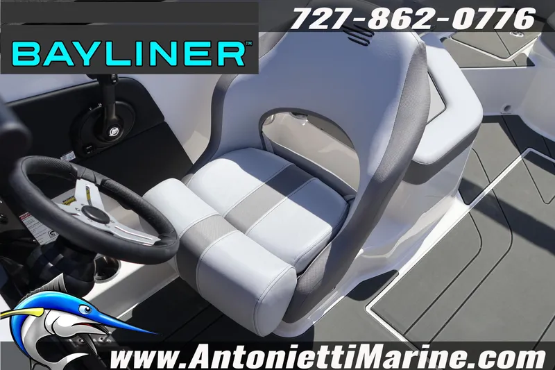 Slide: The Image of Captain's seat and steering wheel of 2026 Bayliner V20 boat, featuring modern design. - 26