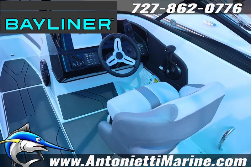 Slide: The Image of 2026 Bayliner V20 boat interior with steering wheel and seating, Antonietti Marine branding. - 6