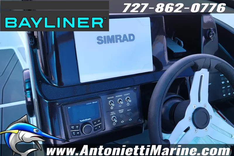 Slide: The Image of 2026 Bayliner V20 dashboard with Simrad display and steering wheel, Antonietti Marine branding. - 7