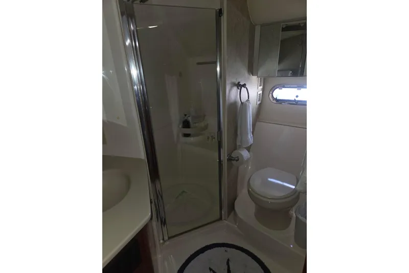 Slide: The Image of Bathroom interior of 2001 Tiara Yachts 5200 Express with shower and toilet. - 30