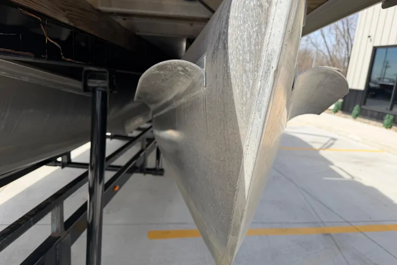 Slide: The Image of Close-up of 2018 Godfrey Sweetwater 2486 SB pontoon boat hull on trailer. - 10