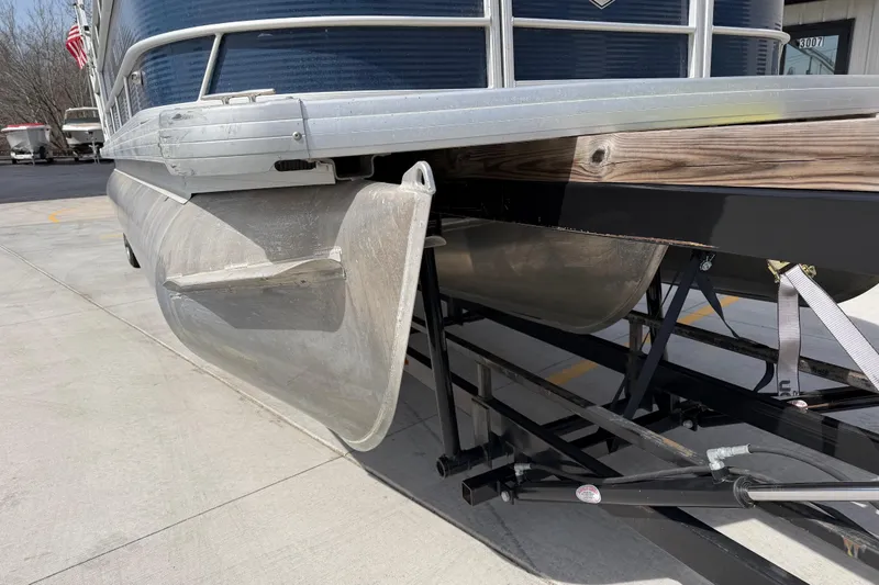 Slide: The Image of 2018 Godfrey Sweetwater 2486 SB pontoon boat on trailer, close-up view. - 11
