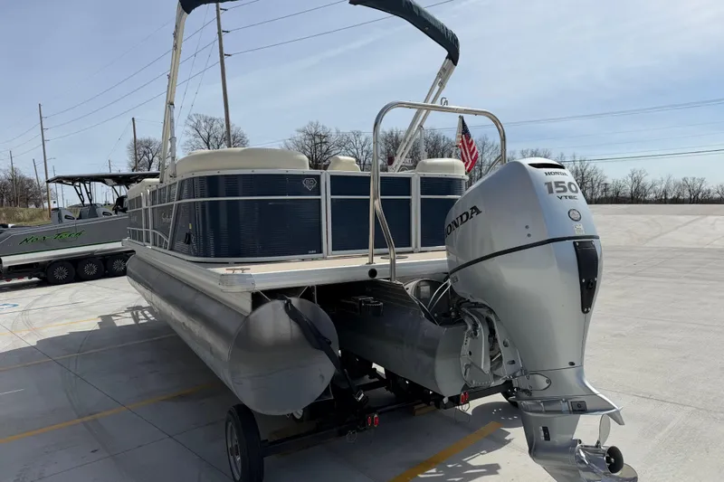 Slide: The Image of 2018 Godfrey Sweetwater 2486 SB pontoon boat with Honda 150 VTEC engine on trailer. - 5