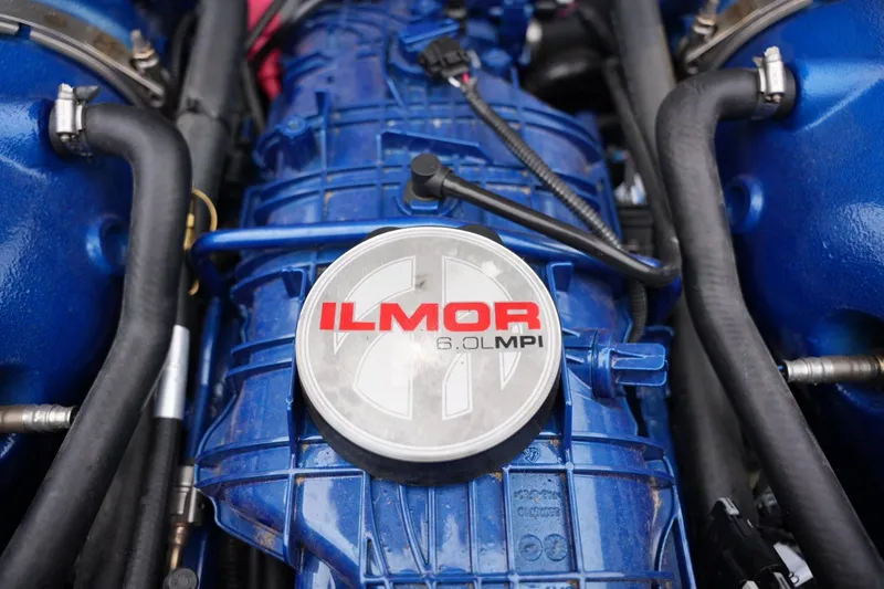 Slide: The Image of Ilmor 6.0L MPI engine in 2021 MasterCraft NXT24 boat, featuring blue components. - 17