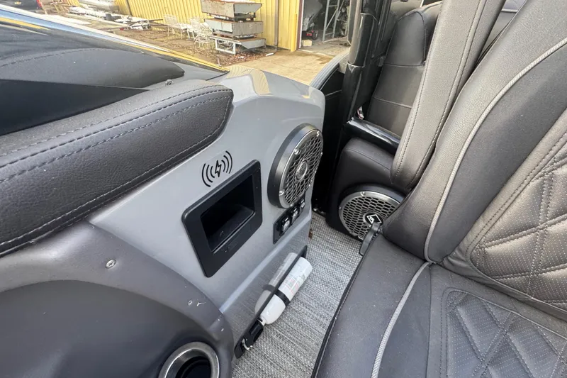 Slide: The Image of Interior of 2023 Bennington 30 QXFBAX2 boat with speaker and wireless charging pad. - 22
