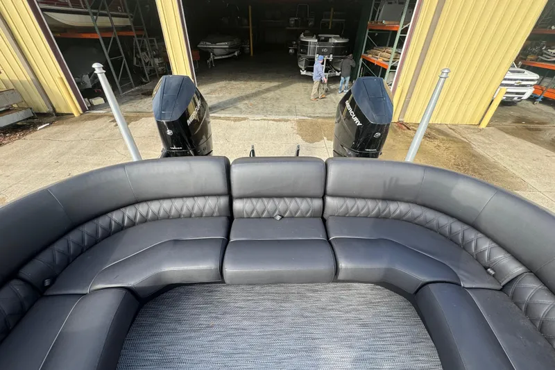 Slide: The Image of 2023 Bennington 30 QXFBAX2 boat with luxurious seating and dual Mercury engines. - 28