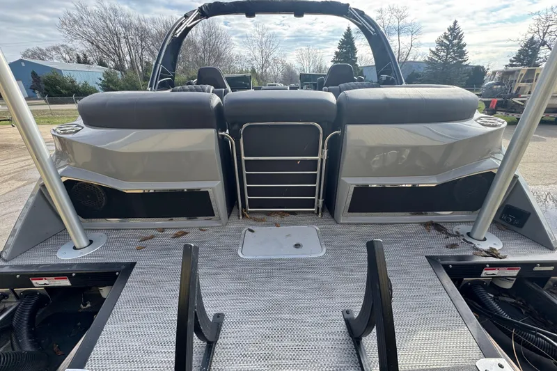 Slide: The Image of 2023 Bennington 30 QXFBAX2 boat interior with sleek seating and modern design. - 29