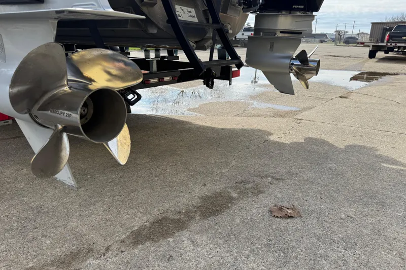 Slide: The Image of Rear view of 2023 Bennington 30 QXFBAX2 boat with dual Mercury propellers. - 32