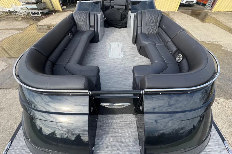 Slide: The Image of 2023 Bennington 30 QXFBAX2 pontoon boat with luxurious black seating and sleek design. - 9