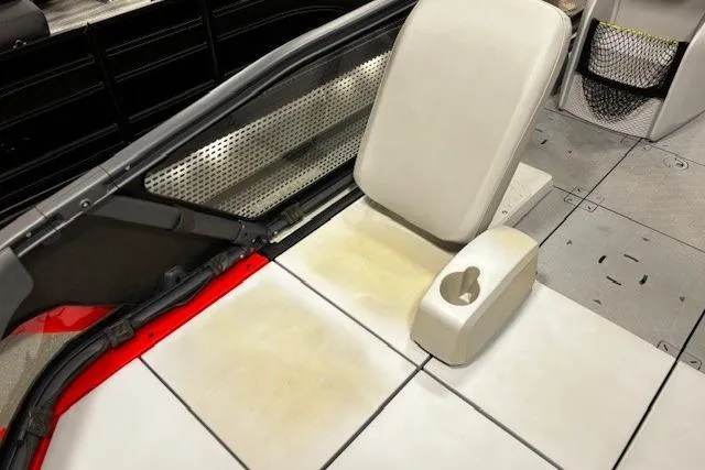 Slide: The Image of 2022 Sea-Doo Switch Cruise 21 interior with beige seating and cup holder. - 20