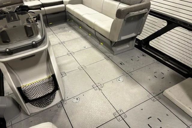 Slide: The Image of Interior of 2022 Sea-Doo Switch Cruise 21 with modular seating and spacious deck. - 21