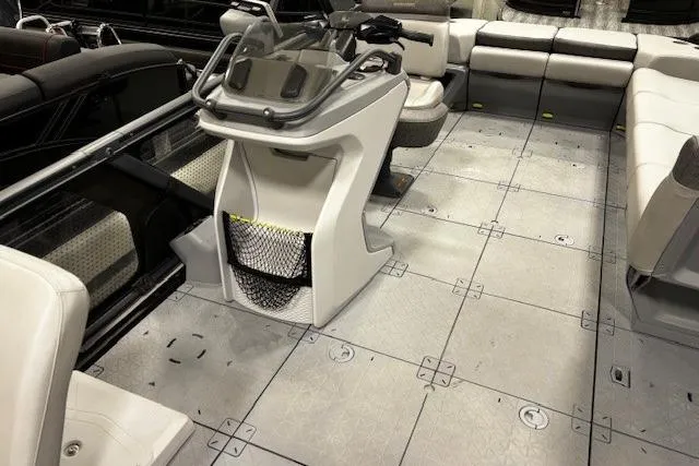 Slide: The Image of 2022 Sea-Doo Switch Cruise 21 interior with spacious seating and modern helm design. - 6