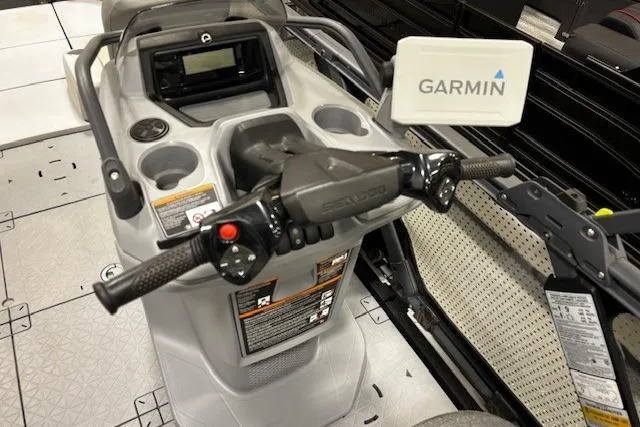 Slide: The Image of 2022 Sea-Doo Switch Cruise 21 dashboard with Garmin navigation system and controls. - 9