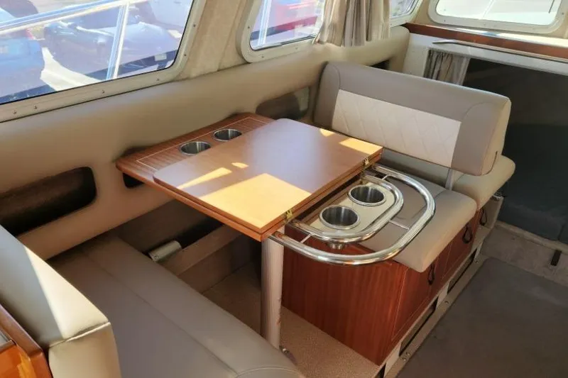 Slide: The Image of Interior of 2023 KingFisher 3025 Destination boat with seating and foldable table. - 10
