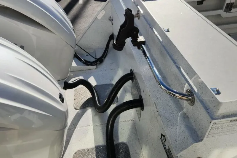 Slide: The Image of 2023 KingFisher 3025 Destination boat with dual outboard motors and sleek design. - 21