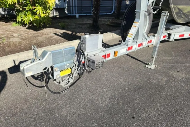 Slide: The Image of Trailer hitch and equipment of 2023 KingFisher 3025 Destination on pavement. - 25