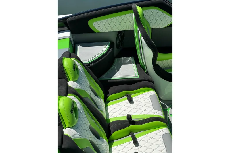 Slide: The Image of Luxurious interior of 2025 Performance Powerboats P360 with green and white quilted seats. - 6