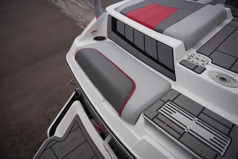 Slide: The Image of 2022 Malibu Wakesetter 23 MXZ boat interior with sleek seating and modern design. - 18