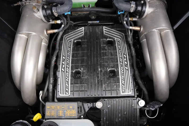 Slide: The Image of Supercharged LT4 engine in 2022 Malibu Wakesetter 23 MXZ boat. - 19