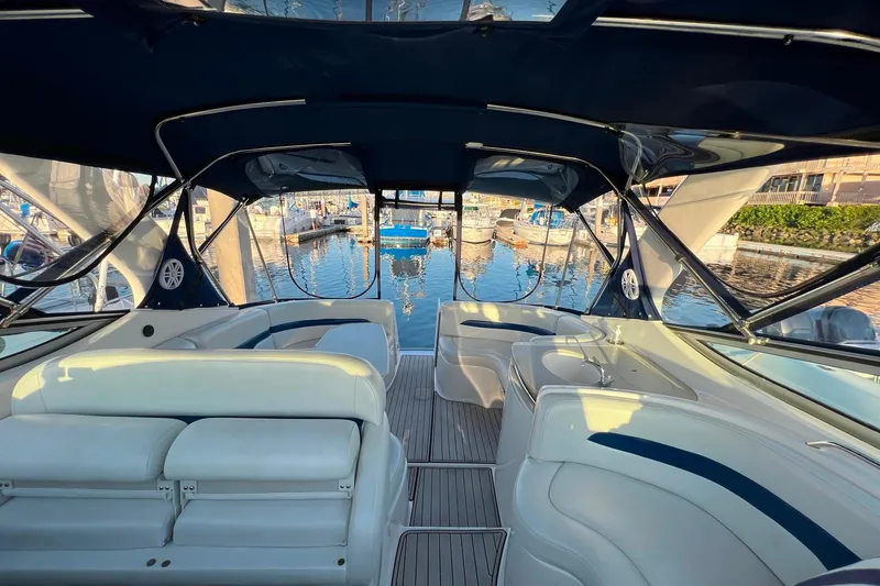 Slide: The Image of Luxurious interior of 2003 Chaparral Signature 320 yacht docked at marina. - 11