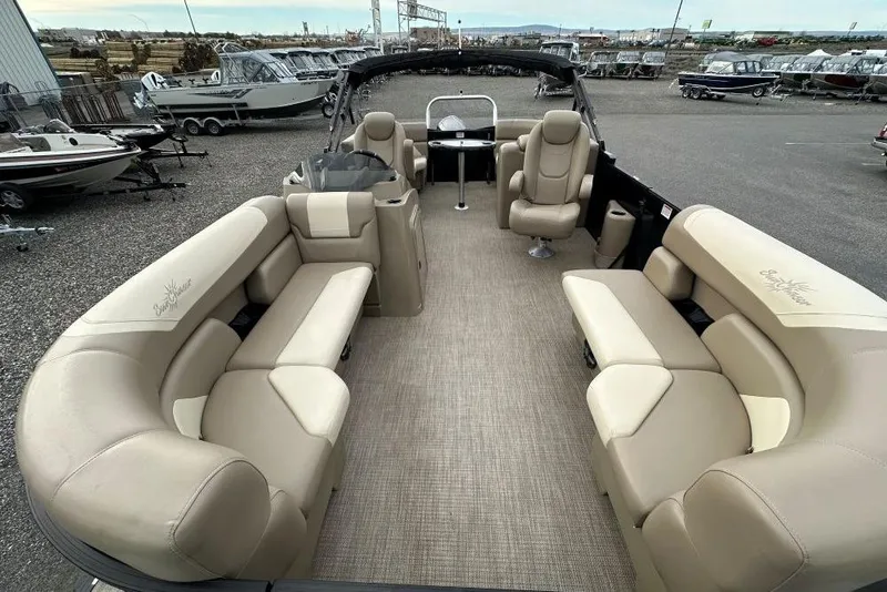 Slide: The Image of 2024 SunChaser Geneva Cruise 20 LR DH pontoon boat with spacious seating and modern design. - 6