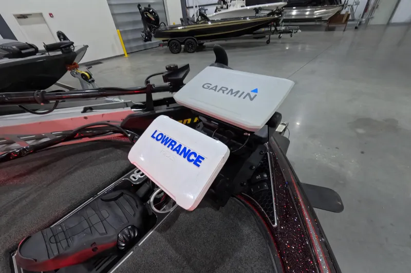 Slide: The Image of 2017 Skeeter FX20 boat with Garmin and Lowrance navigation systems in a showroom. - 7