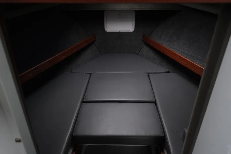 Slide: The Image of 2024 Hewescraft 270 Pacific Explorer ET Hardtop cabin interior with cushioned seating. - 15