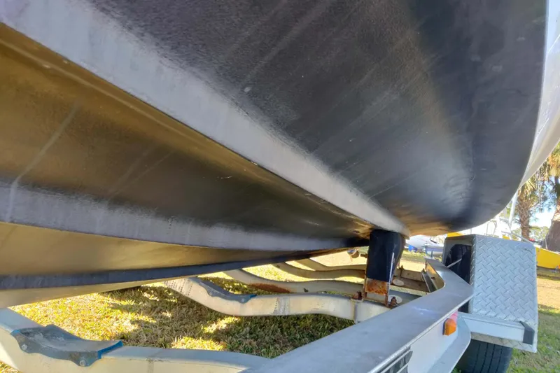 Slide: The Image of 2022 Bayliner VR6 Bowrider OB on trailer, showing hull and trailer details. - 28