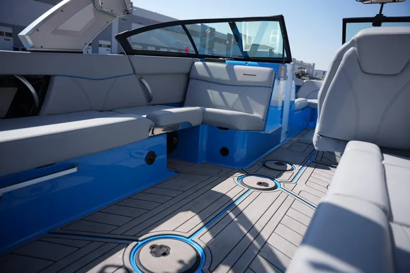 Slide: The Image of Interior of 2021 MasterCraft XT25 boat with sleek seating and modern design. - 14