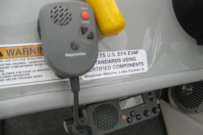 Slide: The Image of Control panel of a 2013 Bayliner 195 Discovery boat with Raymarine equipment. - 13