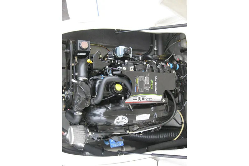 Slide: The Image of Engine of 2013 Bayliner 195 Discovery boat, featuring a 3.0 MPI motor. - 17