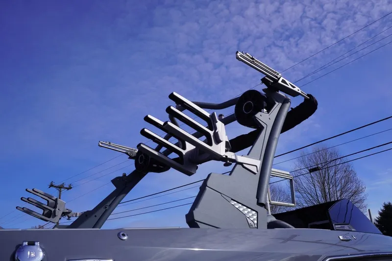 Slide: The Image of 2023 Malibu M220 boat tower against a clear blue sky. - 15
